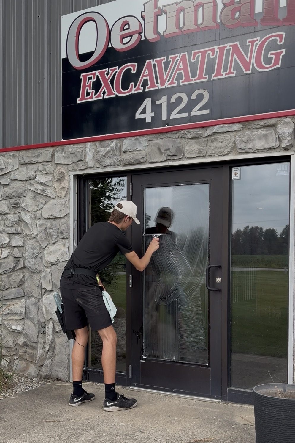 Cleaning a commercial storefront door